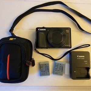 Canon SX740 camera, batteries and case